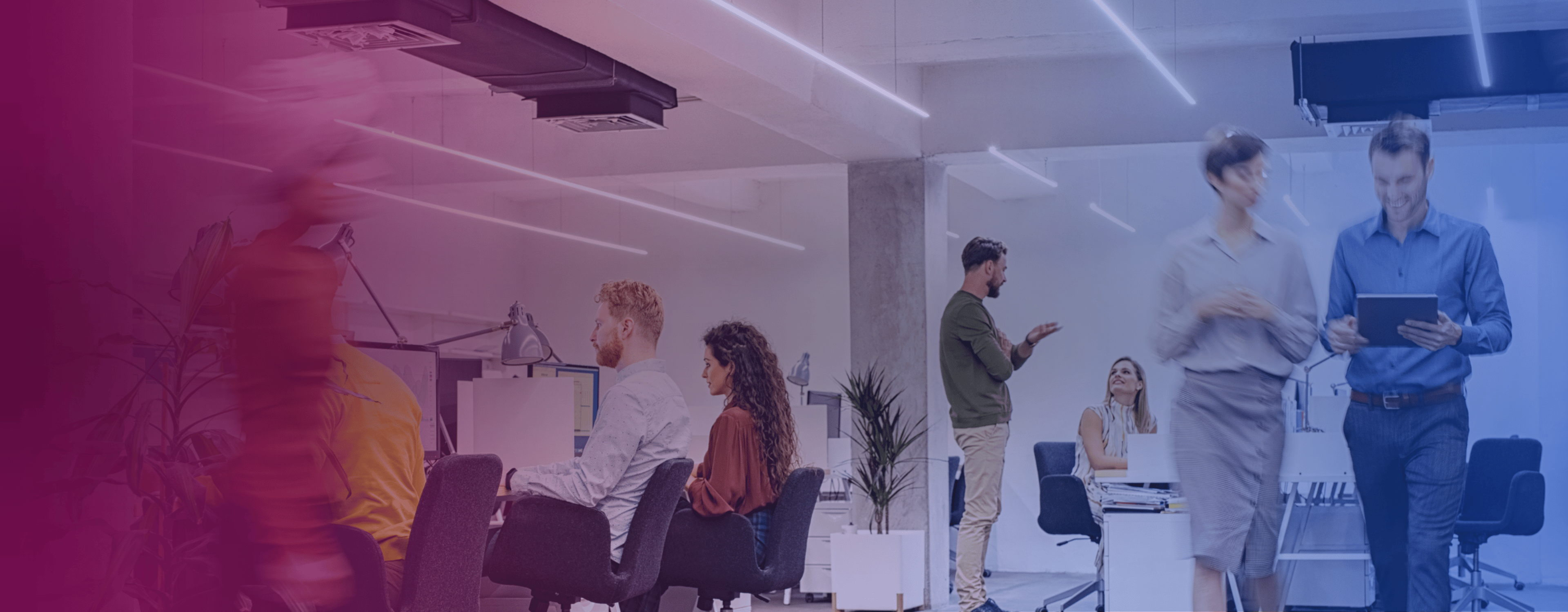 A stock image of people working in an office